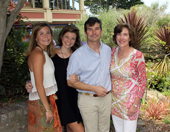 - Rick and Suzanne Weichert. (Photo at right: Daughters Lauren and Jane with Rick and Suzanne.)