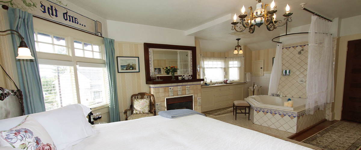 monterey bay bed and breakfast room with ocean views, fireplace and spa tub