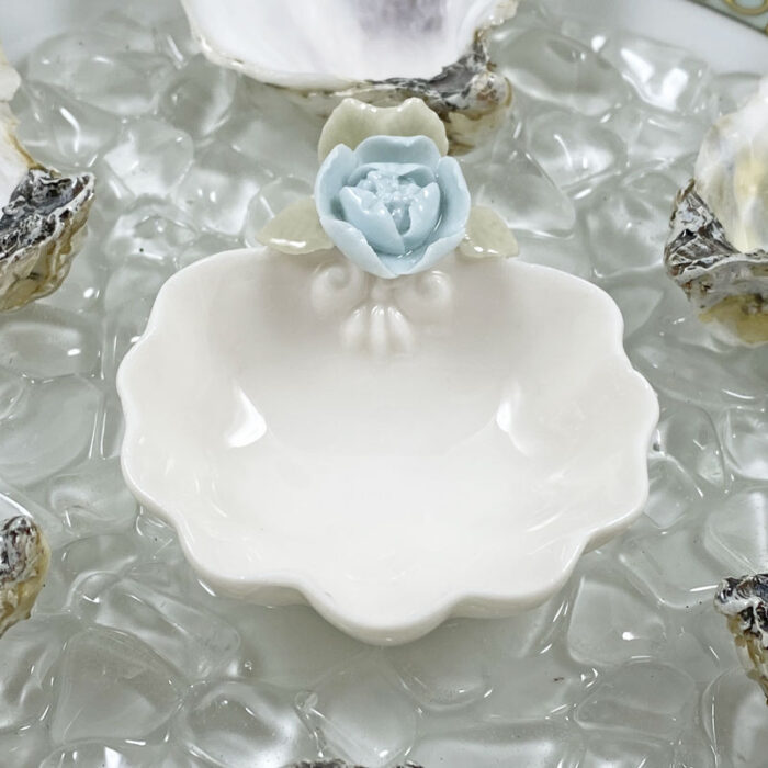 Porcelain flower sauce bowl detail