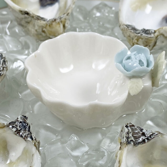 detail of porcelain flower sauce bowl