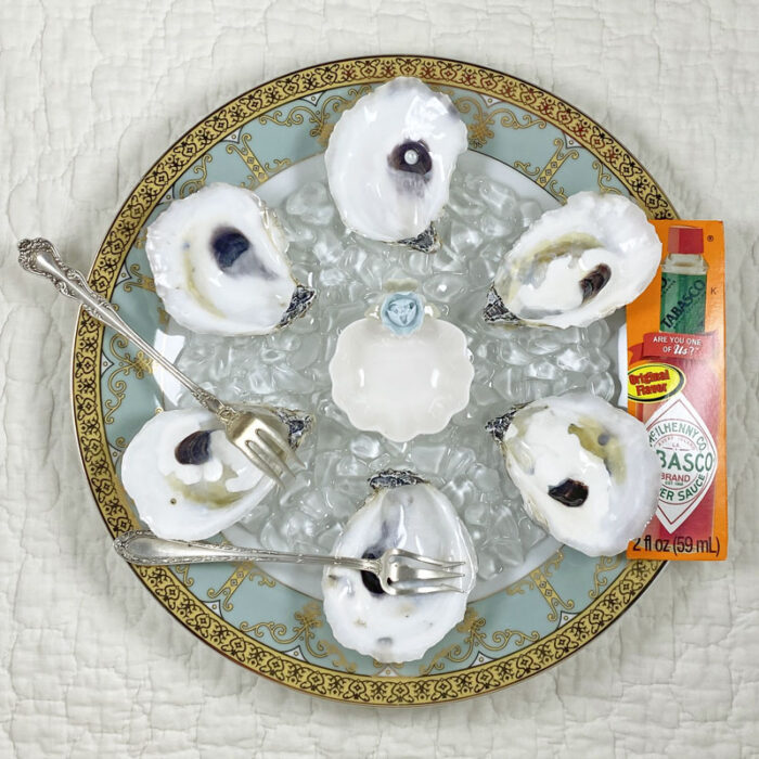 Oyster Plate with real oyster shell wells and two silver oyster forks